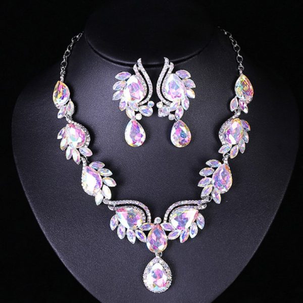 Brilliant gemstone set boosts bridal dress charm.